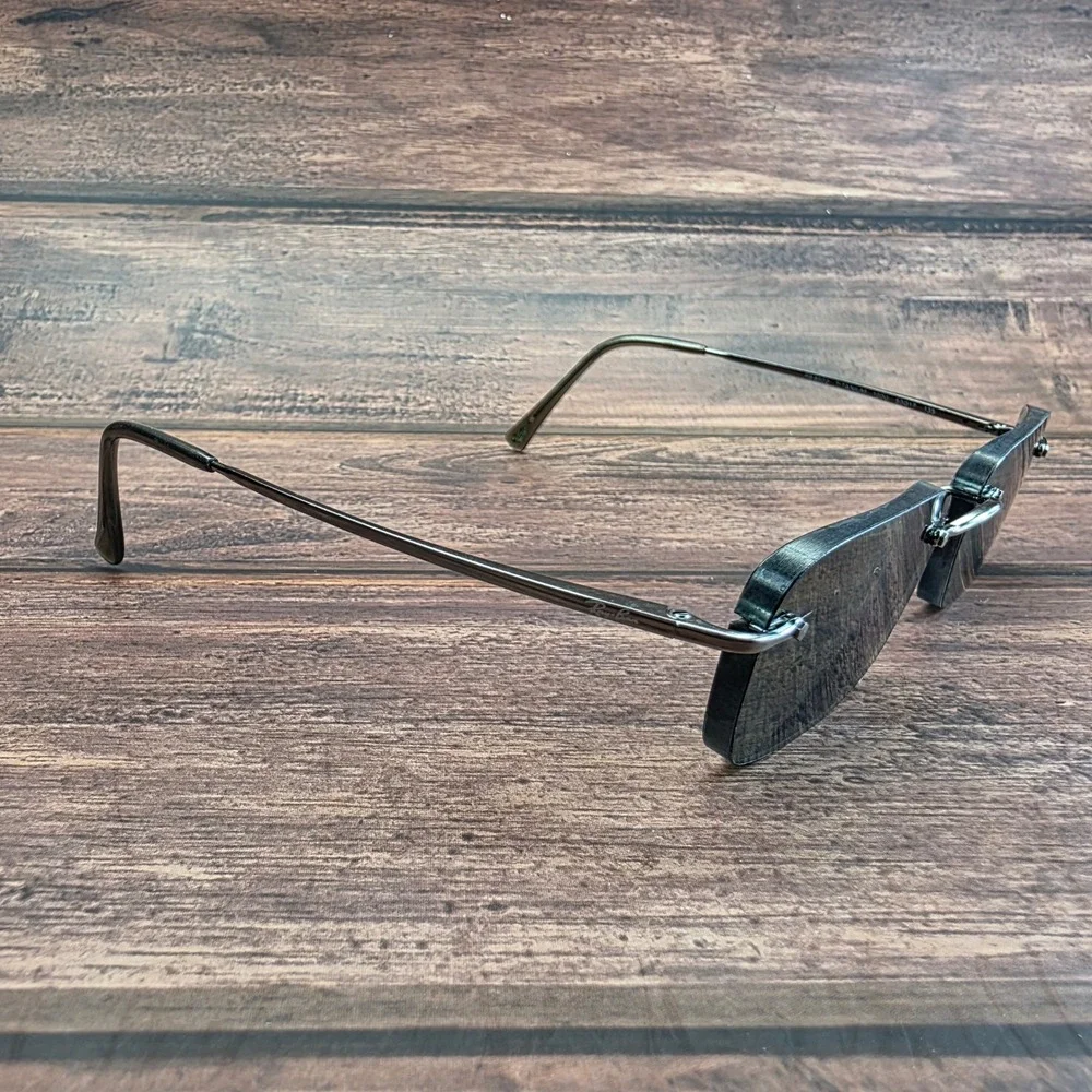Ray-Ban RB 8502 1000 Titanium Rimless Sunglasses Gunmetal Rectangular Mens Italy